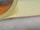 Misfit Item 0134 Rhodia Staplebound Lined Paper Pad in Orange - 8.25 x 12.5  (Yellow Paper)