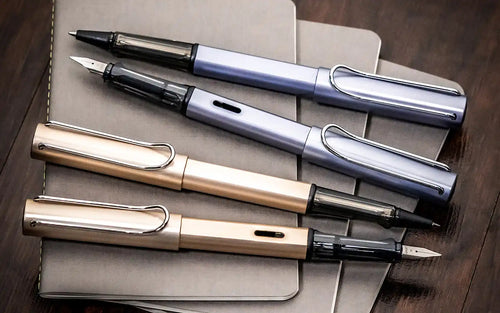 Four fountain pens.